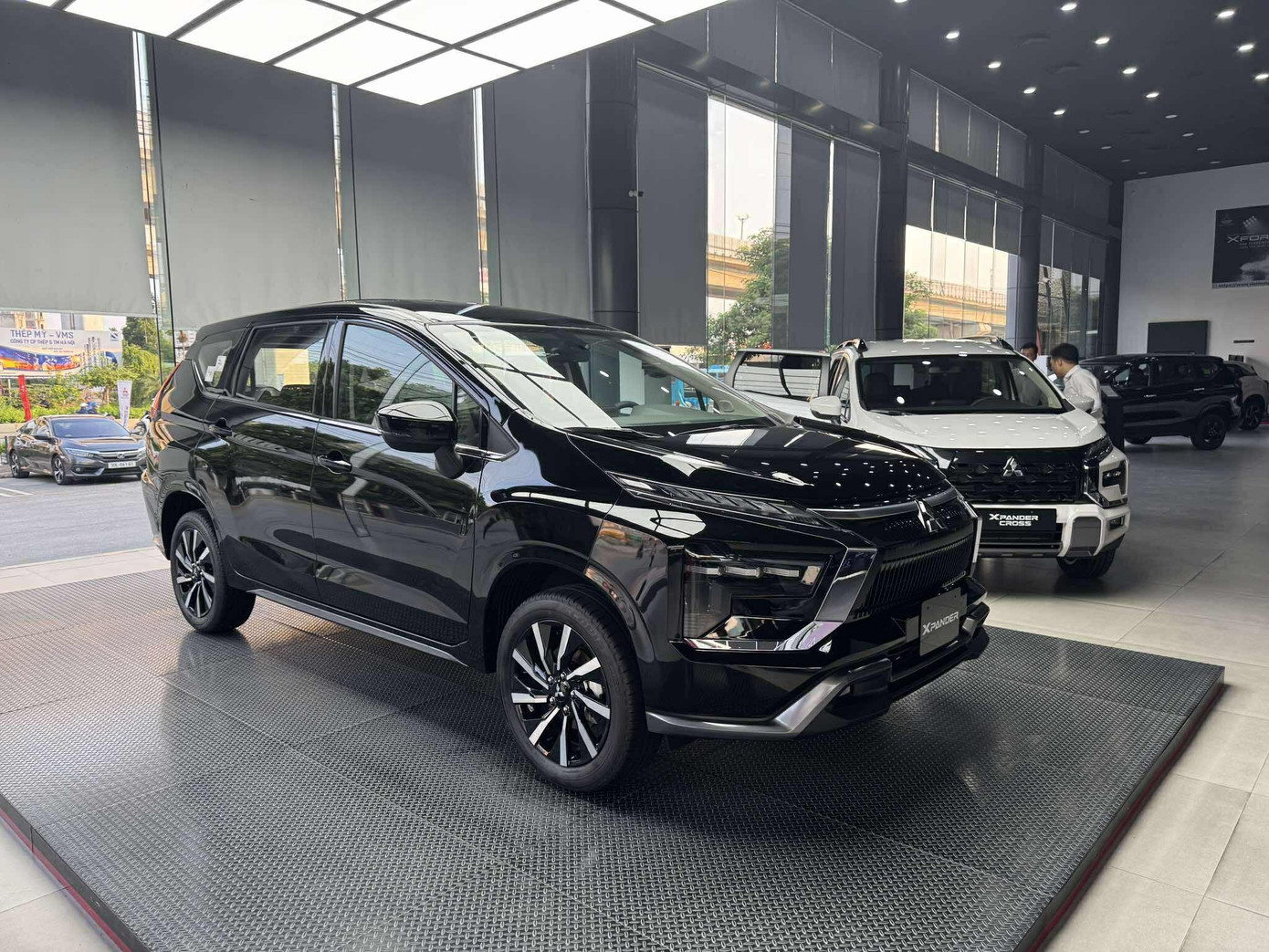Loạt ô tô ra mắt chưa lâu đã giảm giá tại thị trường Việt Nam- Ảnh 1. Mitsubishi Xpander và Xpander Cross phiên bản nâng cấp